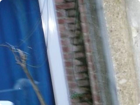 Kunnen wij buur verplichten gemene muur te behandelen?