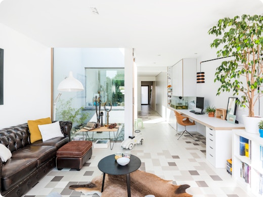 In beeld: Slim ruimtegebruik in een lichtrijke eengezinswoning