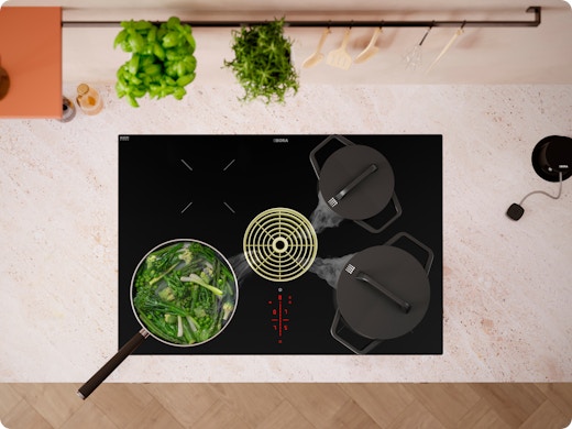 Cuisiner sans hotte classique : la plaque de cuisson avec hotte intégrée est-elle faite pour votre cuisine ?