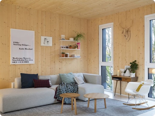 En images : un duplex scandinave où le bois donne le ton